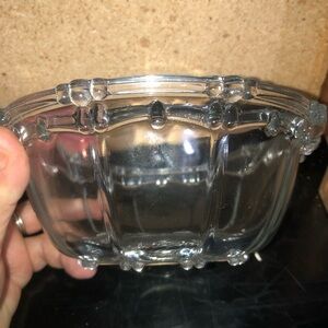 Vintage clear decorative candy dish, roughly 7” across. Classy little bowl.